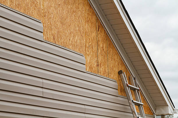 Professional Siding Contractor technician working in USA